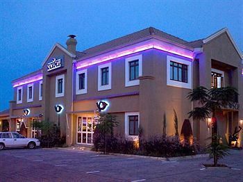 Hotel Front - Evening or Night